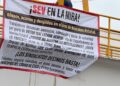 Aparecen mantas en la SEV exigiendo la destitución de funcionarios por  presuntos abusos y despidos injustificados